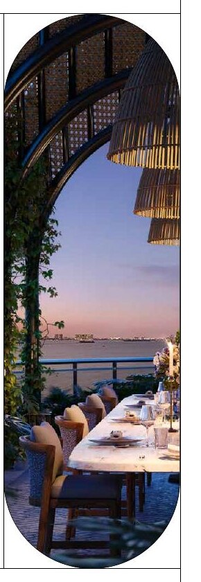 Pabellón de comedor al aire libre frente al agua, Continuum Club & Residences
