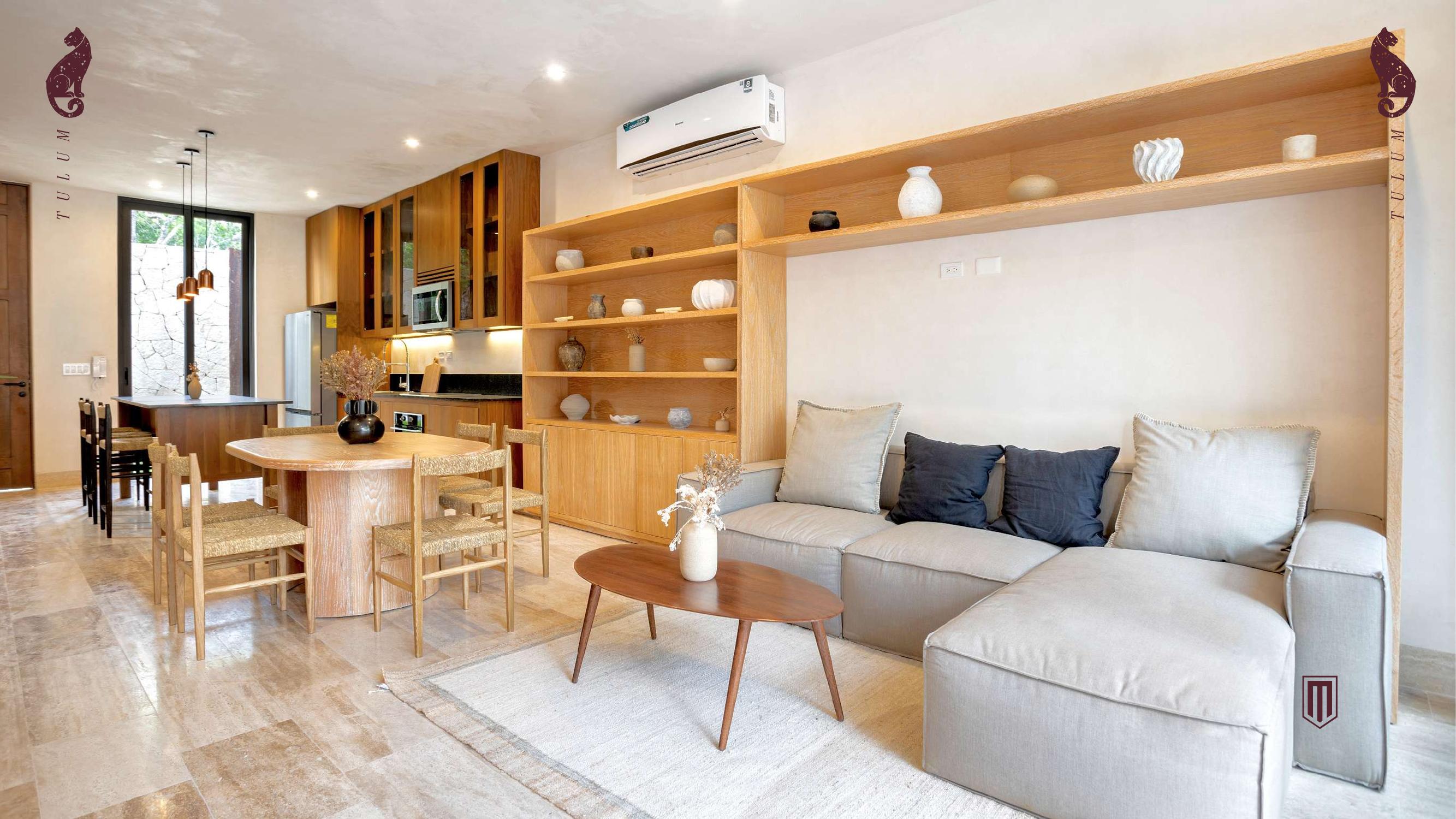 Sala y comedor de una villa en Junglar Tulum